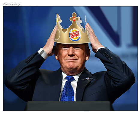 Donald Trump placing a paper crown on his head that read Bugger King.