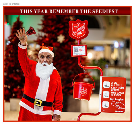 Photo-illustration spoof of Rudy Giluliani, who declared bankruptcy due to a $148 million defamation judgment against him, dressed as a Santa Claus in a mall ringing a bell as he tries to raise money for himself with his version of a Salvation Army Red Kettle charity campaign retitled The Salvation of Rudy.